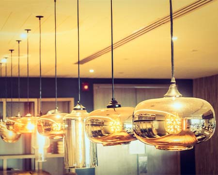 Warm pendant lighting in a finished interior